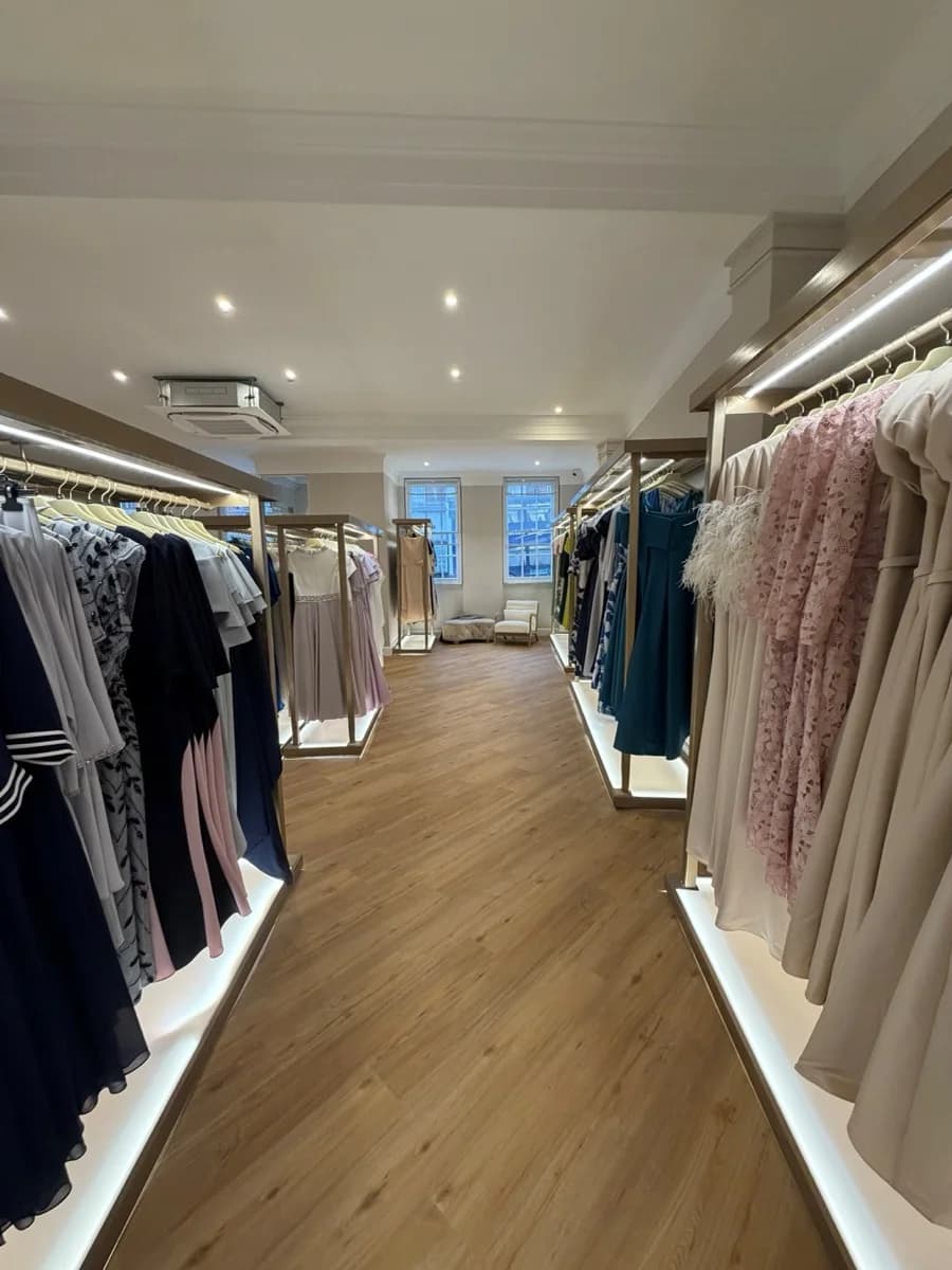 Luxury Mother of the Bride Store bespoke shop fit-out with illuminated display rails