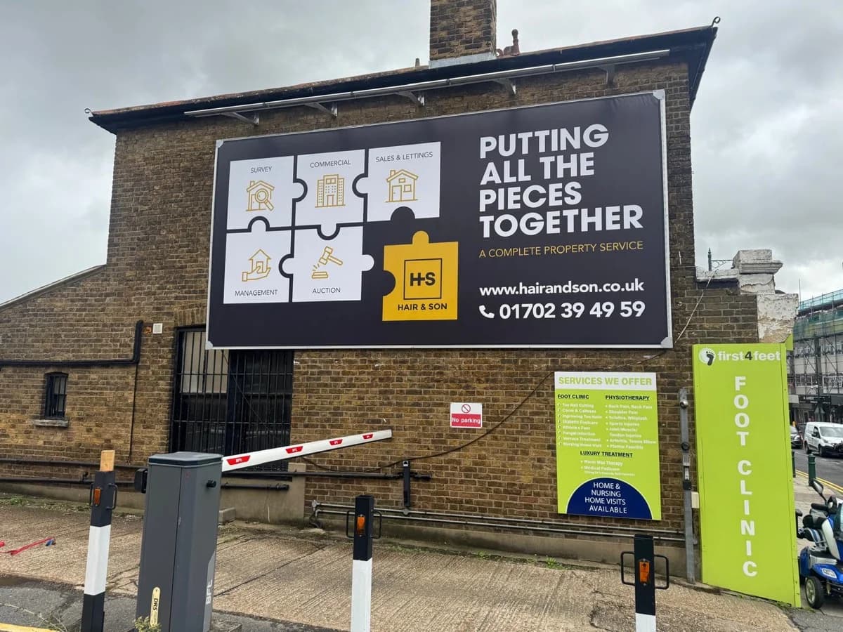 Rayleigh 48 sheet wall mounted billboard with stretch canvas posting system